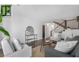 Family room - 6, 2815 Palliser Drive Sw, Calgary, AB T2V3S8 Photo 9