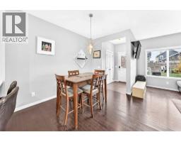 Family room - 88 River Heights Boulevard, Cochrane, AB T4C0J6 Photo 11