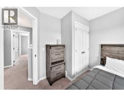 88 River Heights Boulevard, Cochrane, AB T4C0J6 Photo 24