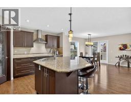Living room - 108 Rainbow Falls Row, Chestermere, AB T1X0N7 Photo 6