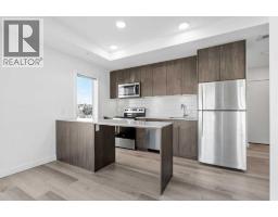 Bedroom - 401, 455 1 Avenue Ne, Calgary, AB T2E0B3 Photo 6