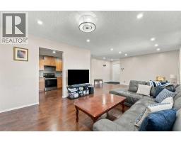 Living room - 95 Rundleson Way Ne, Calgary, AB T1Y3H7 Photo 7