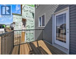Laundry room - 143 Amblefield Avenue Nw, Calgary, AB T3P2B8 Photo 10