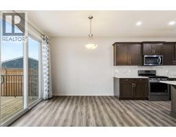Bedroom - 62 Wolf Hollow Way Se, Calgary, AB T2X1T8 Photo 7