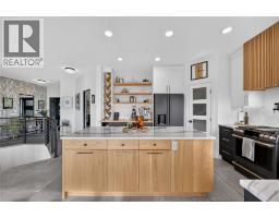 Laundry room - 7079 Jasper Drive, Vernon, BC V1H1P2 Photo 11