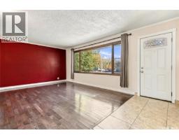 Living room - 1906 St Charles Avenue, Saskatoon, SK S7M0N8 Photo 8