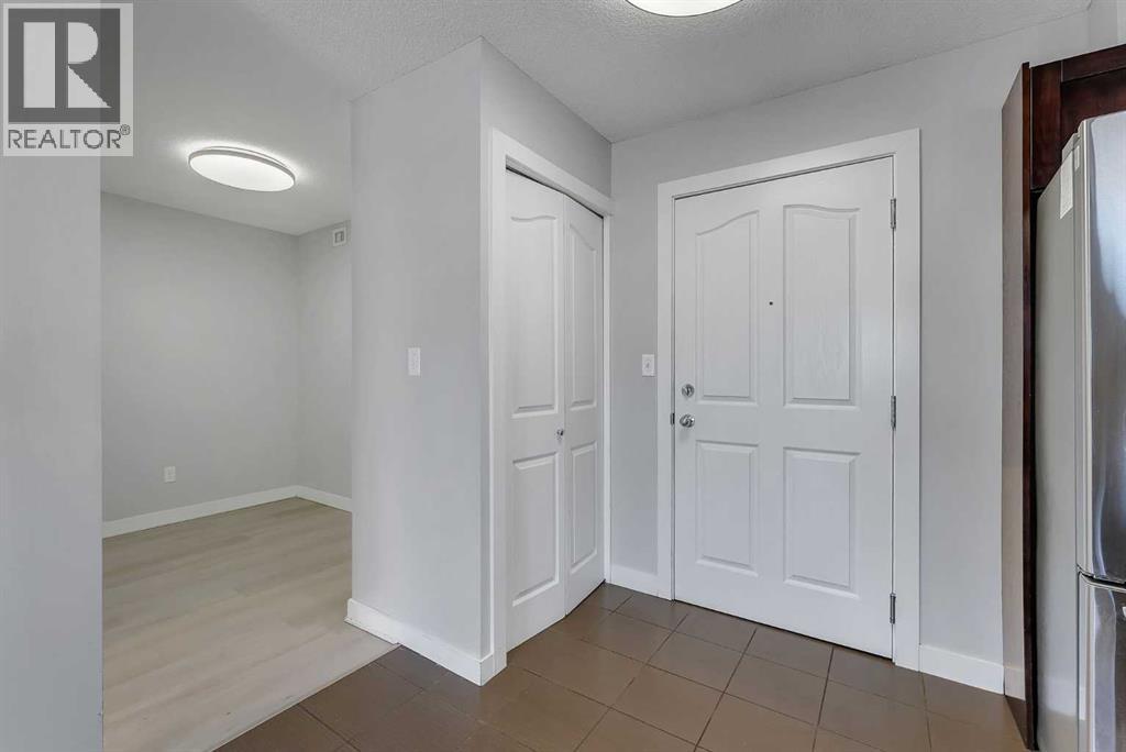 2402, 403 Mackenzie Way SW, Airdrie — photo 3