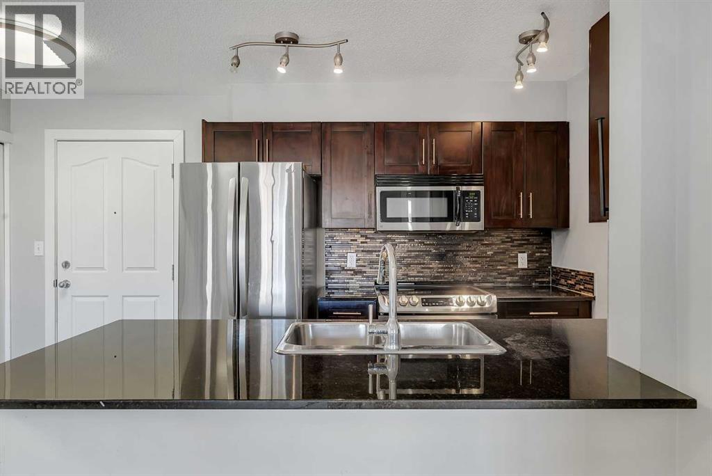 2402, 403 Mackenzie Way SW, Airdrie — photo 6