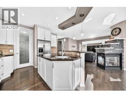 Living room - 152 Hawkmere Way, Chestermere, AB T1X0C8 Photo 9