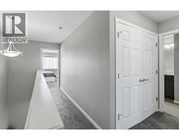 Laundry room - 124 Cityline Square Ne, Calgary, AB T3N2H5 Photo 12