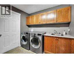 Laundry room - 331 Wood Valley Bay Sw, Calgary, AB T2W5Y6 Photo 7