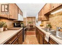 Bedroom - 201, 512 Cedar Crescent Sw, Calgary, AB T3C2Y8 Photo 9
