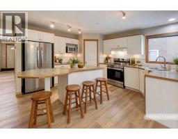 Family room - 63 Sierra Madre Crescent Sw, Calgary, AB T3H3M4 Photo 6