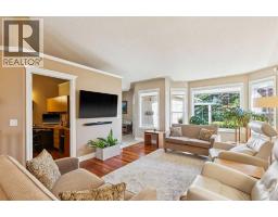 Family room - 121 Sierra Morena Green Sw, Calgary, AB T3H3E4 Photo 9