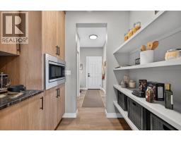 Family room - 140 Fireside Close, Cochrane, AB T4C0R4 Photo 11