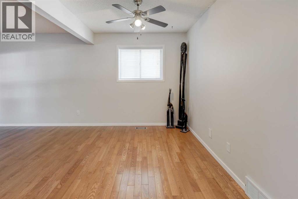 28 Woodside Circle NW, Airdrie — photo 11