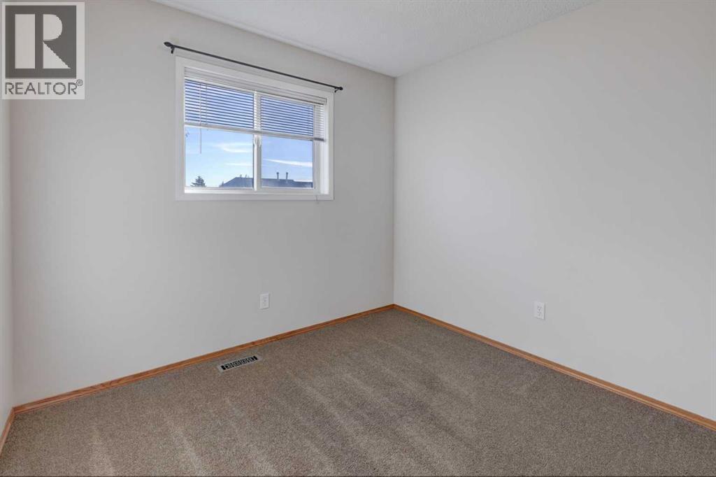 28 Woodside Circle NW, Airdrie — photo 21