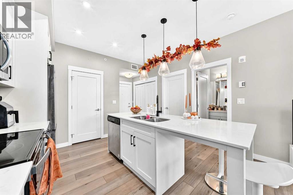 The spacious island makes this kitchen a natural spot for morning coffee, casual meals, or catching up while dinner comes together