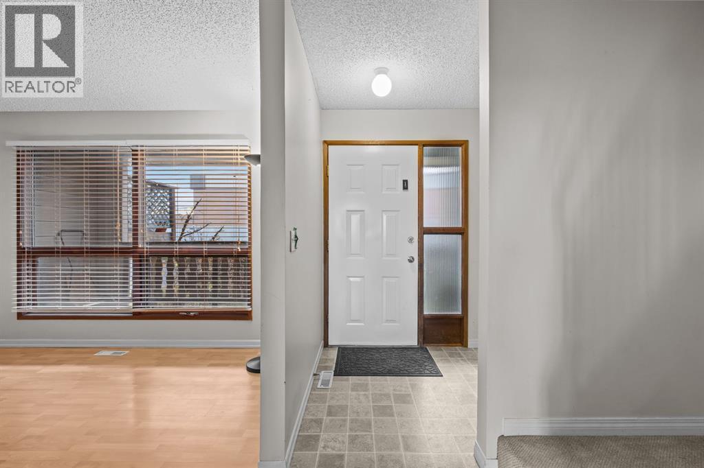 Step inside to a bright entry with the living room right beside it