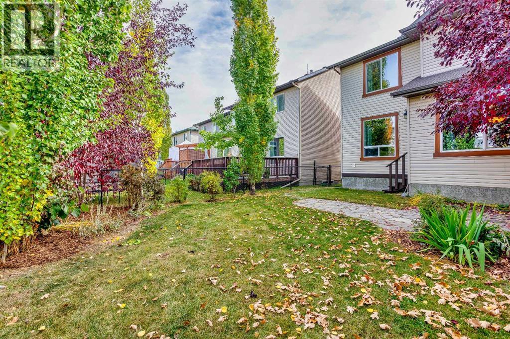 66 Cougarstone Close SW, Calgary — photo 32