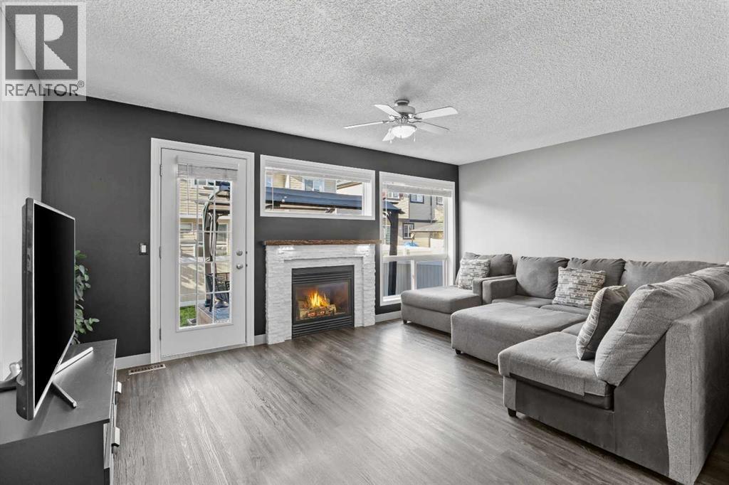 With a door straight out to the deck, summer evenings move easily from the sectional to dinner outside and back again