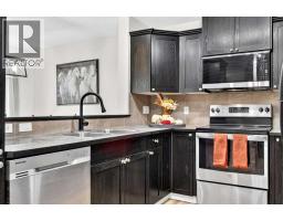 Bedroom - 74 Heritage Landing, Cochrane, AB T4C0E3 Photo 10