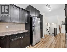 Bedroom - 74 Heritage Landing, Cochrane, AB T4C0E3 Photo 13