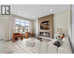 Laundry room - 4 Topaz Place, Cochrane, AB T4C3K2 Photo 11