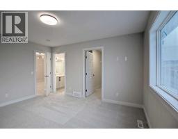 12 Topaz Place, Cochrane, AB T4C3K2 Photo 25