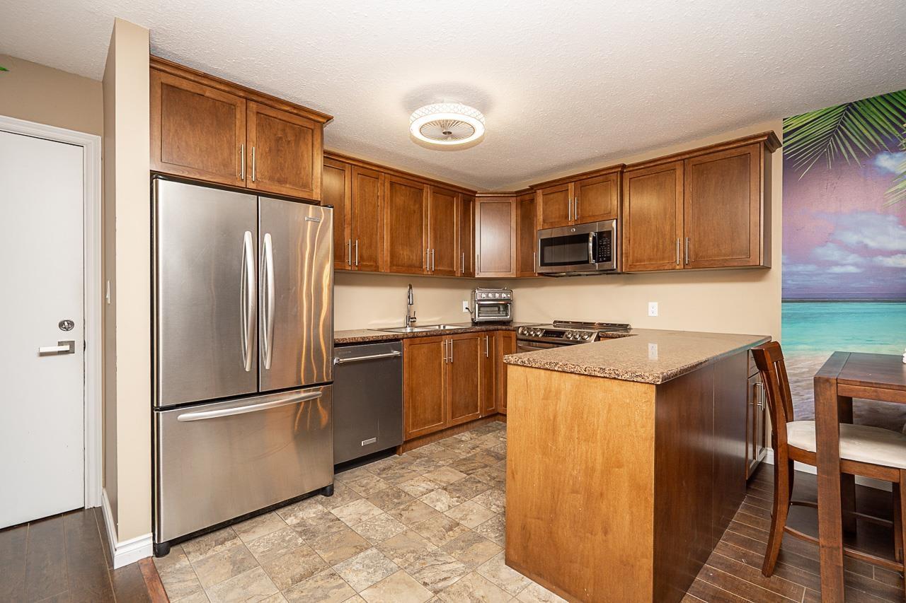 303 33464 GEORGE FERGUSON WAY, Abbotsford - Image 1