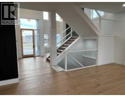 Sunroom - 16 Rockcliff Hill Nw, Calgary, AB T3G0G6 Photo 8