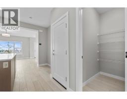 Laundry room - 196 Huxbury View Ne, Calgary, AB T2A8C3 Photo 11