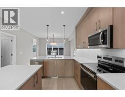 Family room - 196 Huxbury View Ne, Calgary, AB T2A8C3 Photo 12
