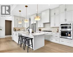102, 140 Marina Cove SE, Calgary — photo 10