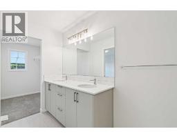 98 Creekview Avenue Sw, Calgary, AB T2X6M7 Photo 12