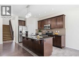 Family room - 111 Windbrook Manor Sw, Airdrie, AB T4B3X2 Photo 8
