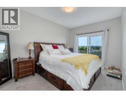 309, 250 Fireside View, Cochrane, AB T4C2M2 Photo 12