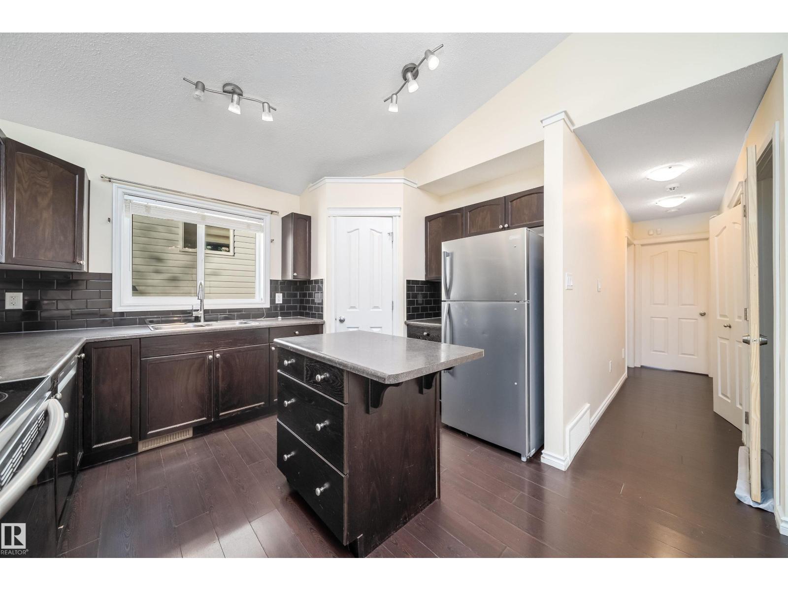 1126 36A Avenue NW, Tamarack — photo 14 of 30: Property photo