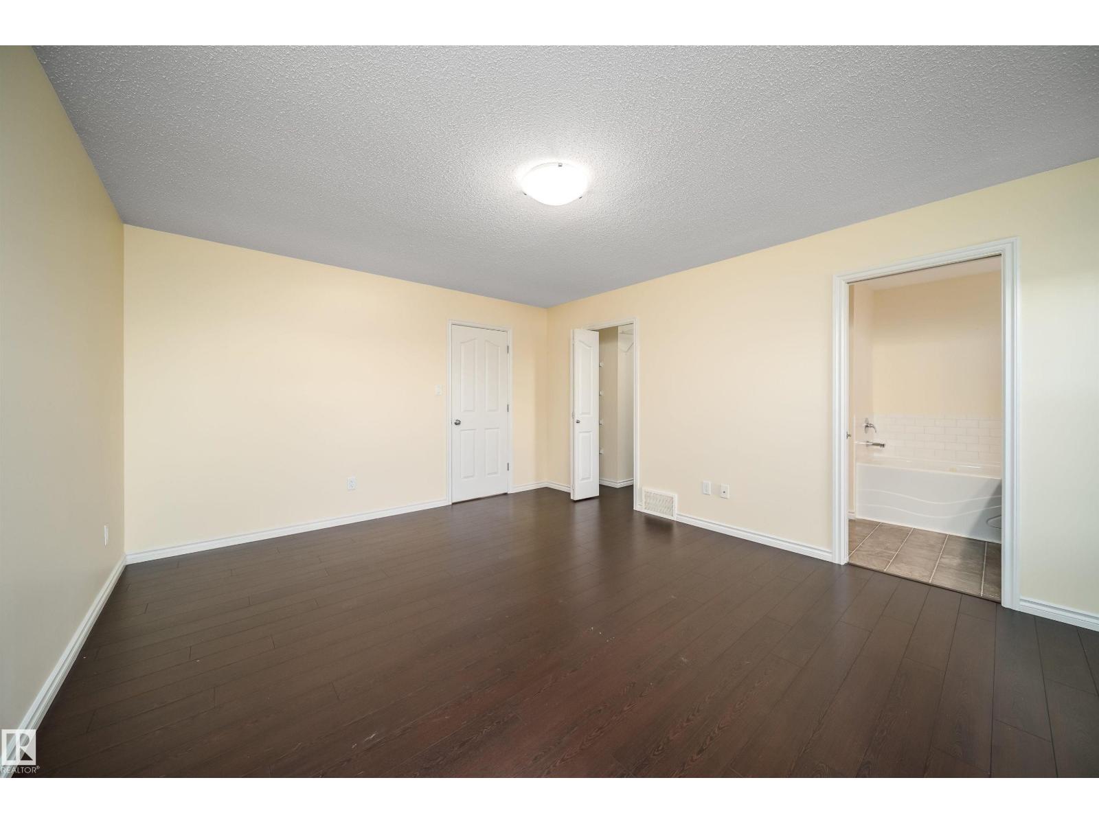 1126 36A Avenue NW, Tamarack — photo 26 of 30: Property photo