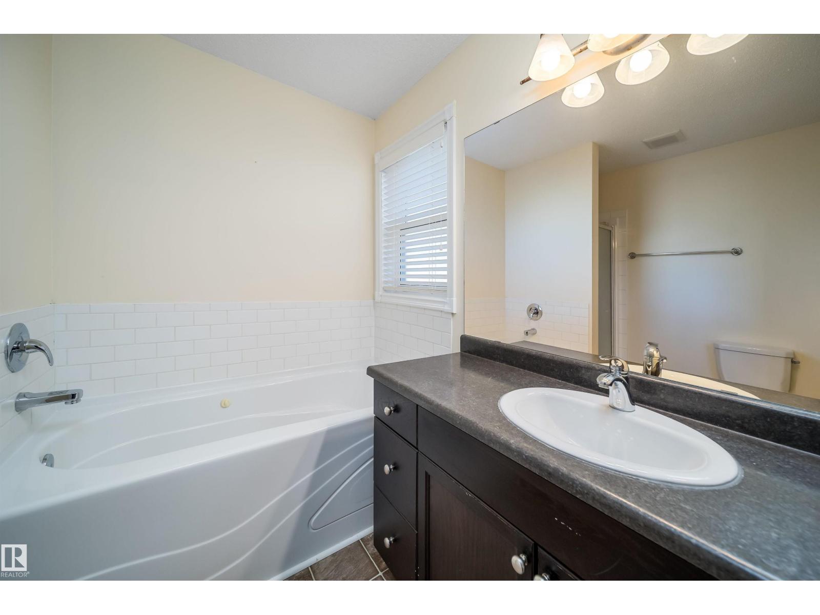 1126 36A Avenue NW, Tamarack — photo 28 of 30: Property photo