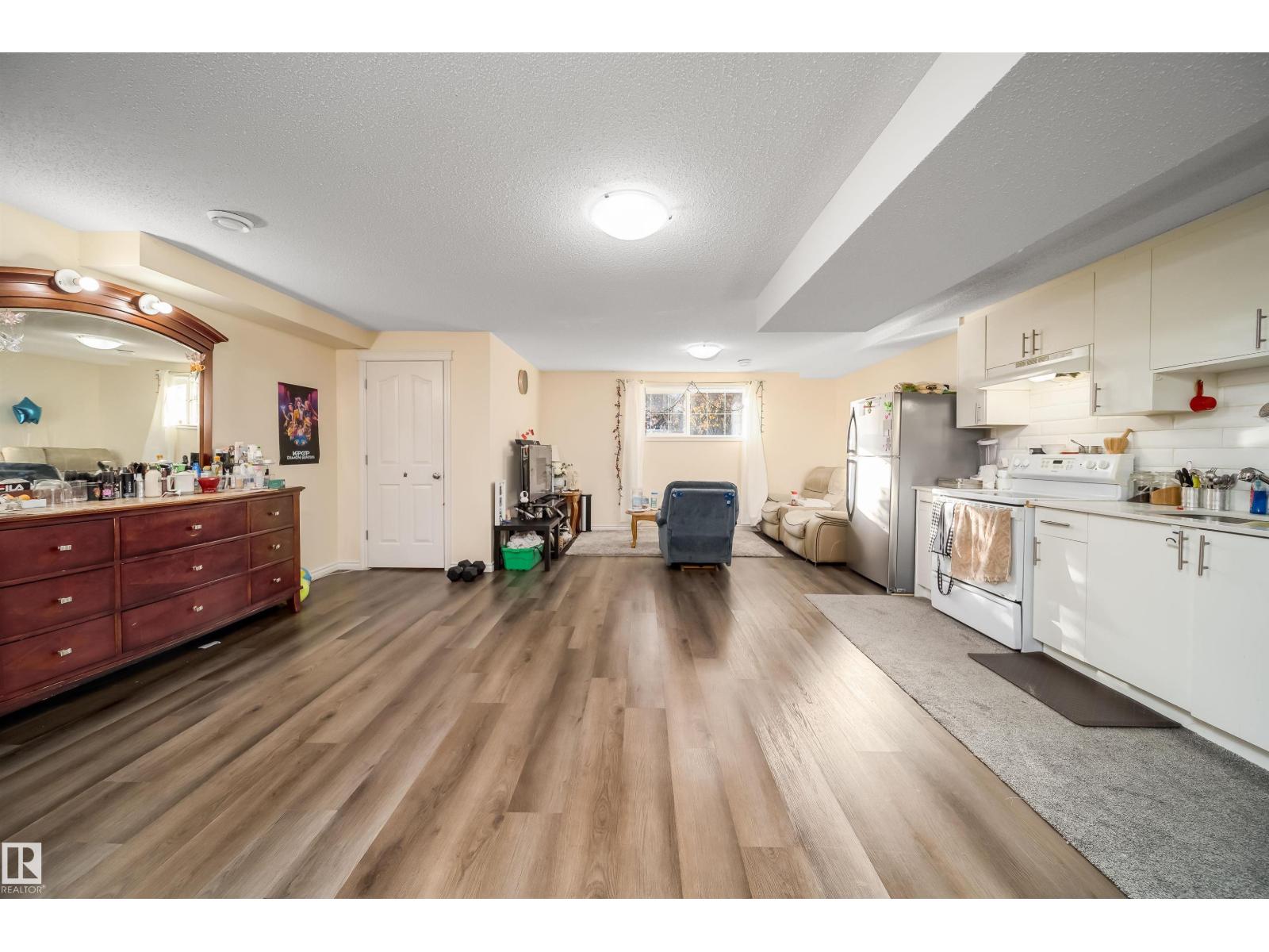 1126 36A Avenue NW, Tamarack — photo 29 of 30: Property photo