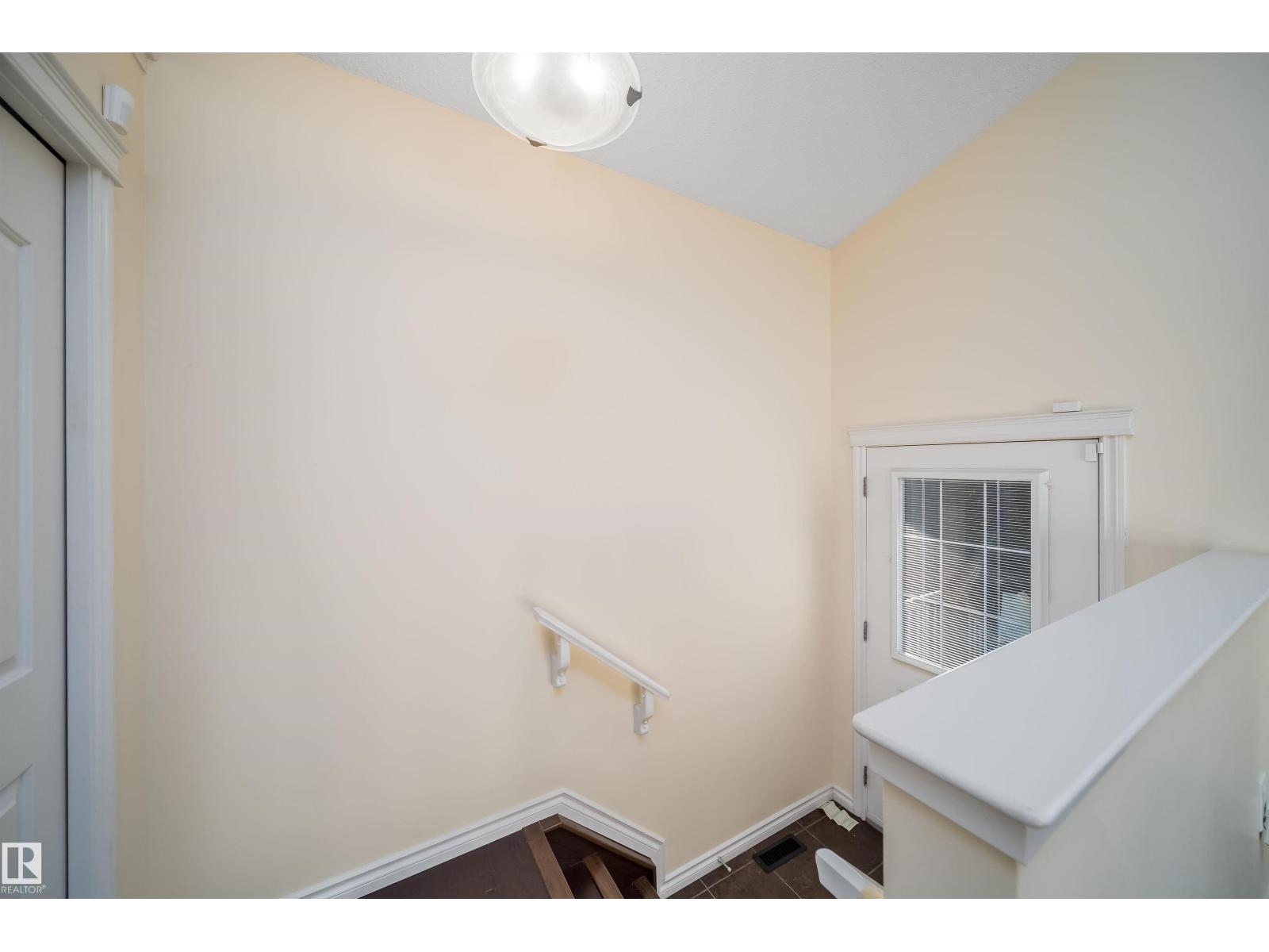1126 36A Avenue NW, Tamarack — photo 9 of 30: Property photo