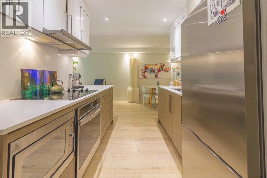 Photo of 402 4134 MAYWOOD STREET 10