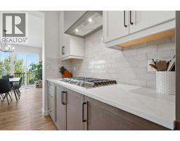 Laundry room - 129 Wolf Hollow Villas Se, Calgary, AB T2X5K1 Photo 13