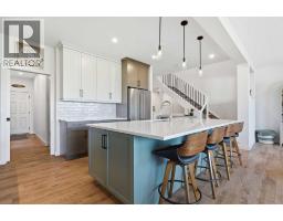 Primary Bedroom - 129 Wolf Hollow Villas Se, Calgary, AB T2X5K1 Photo 14