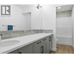129 Wolf Hollow Villas Se, Calgary, AB T2X5K1 Photo 27