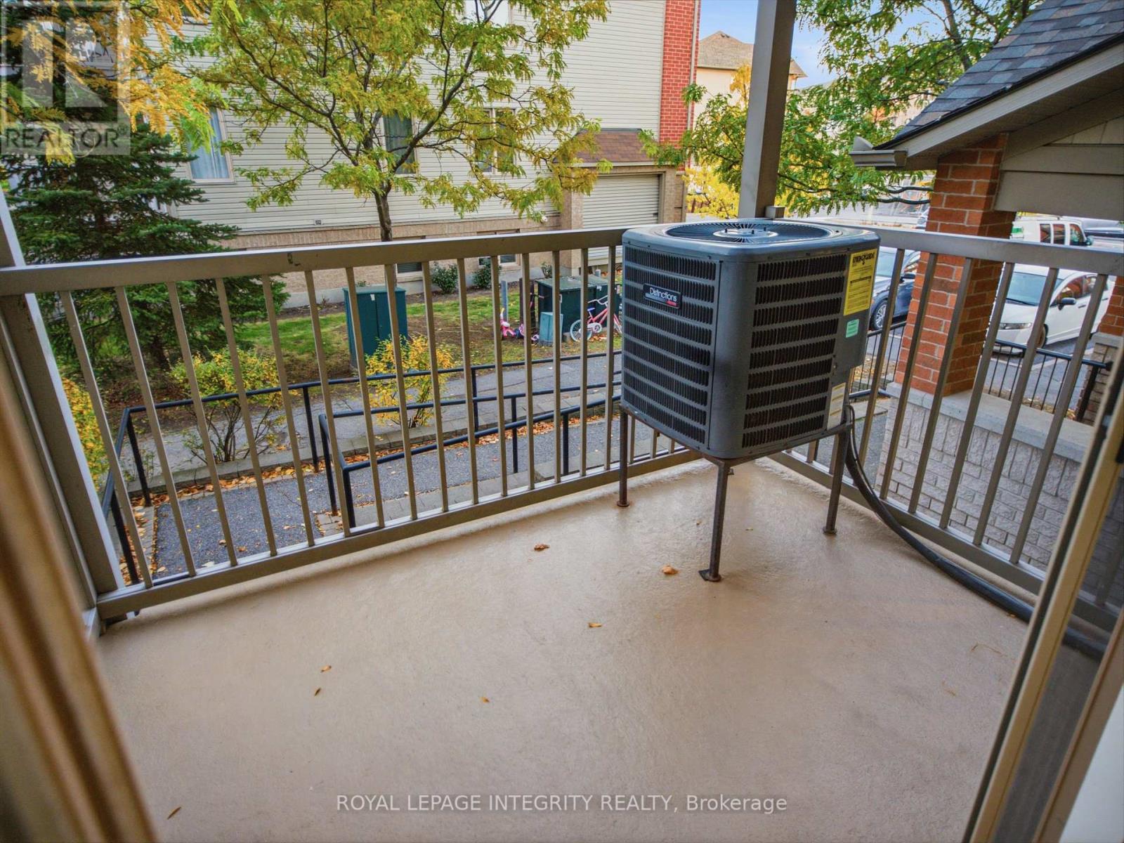 Private balcony with leafy treetop views