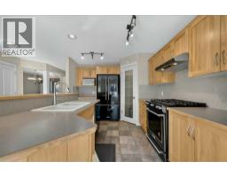 Family room - 238 New Brighton Circle Se, Calgary, AB T2Z4B2 Photo 14