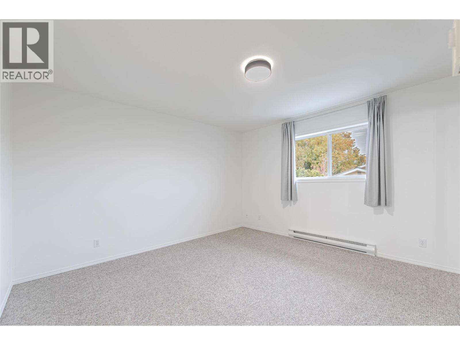 13014 ARMSTRONG Avenue Unit# 208, Summerland