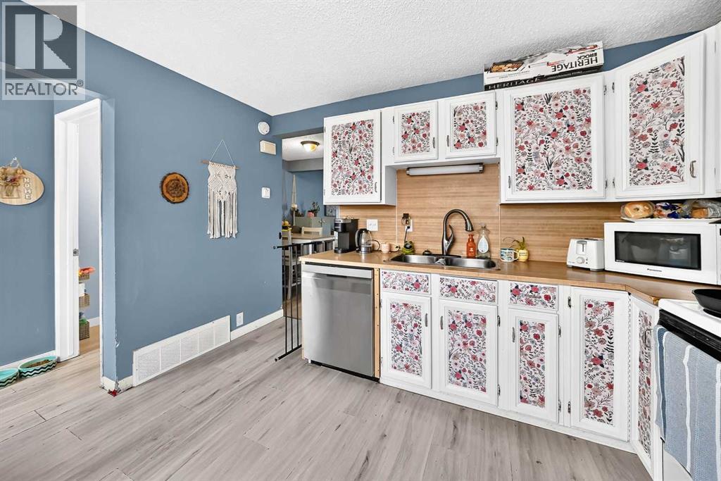 240 Jensen Drive NE, Airdrie — photo 10